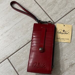 Patricia Nash Berry Red Leather Wristlet..NWT..authentic
Alanna